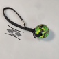 Preview: Grün-schwarzer Ball mit elastischem Band 6,5cm sehr stabil, DuraFoam